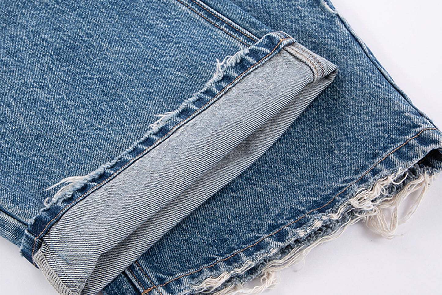 Ripped Curved Spliced Jeans
