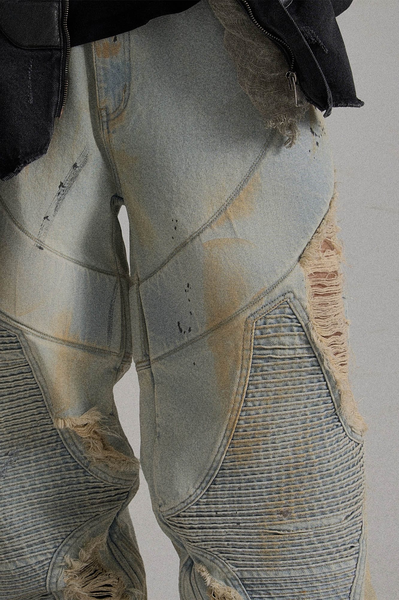 Paneled Heavily Ripped Fringe Jeans