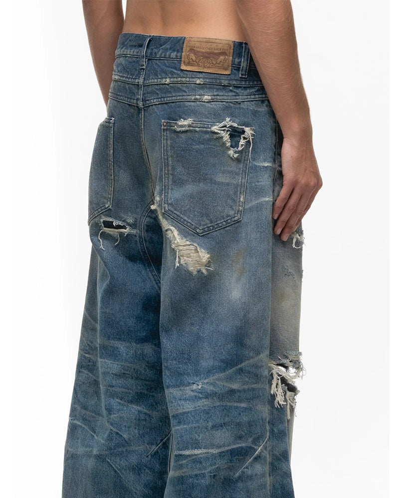 Ripped Curved Spliced Jeans