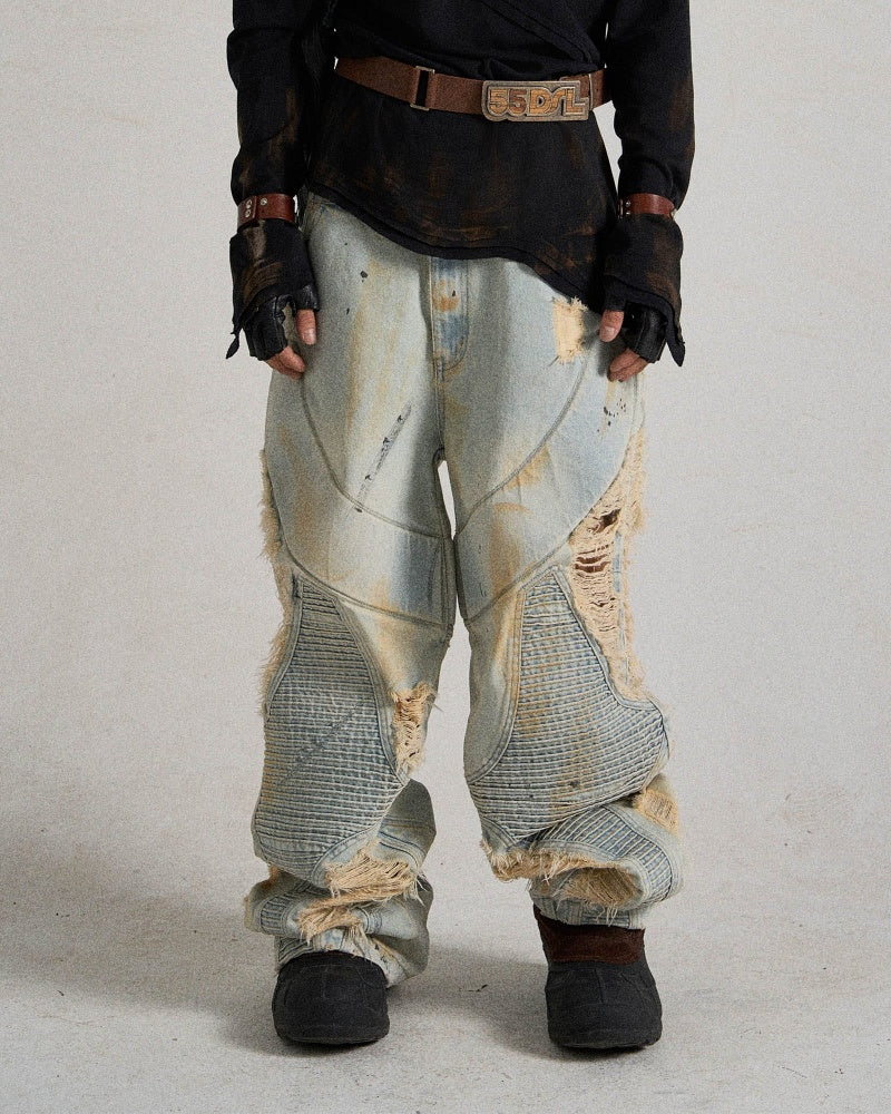 Paneled Heavily Ripped Fringe Jeans