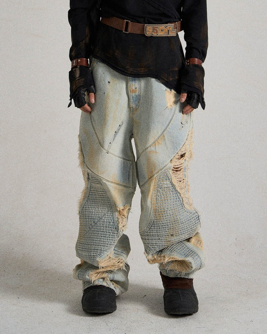 Paneled Heavily Ripped Fringe Jeans