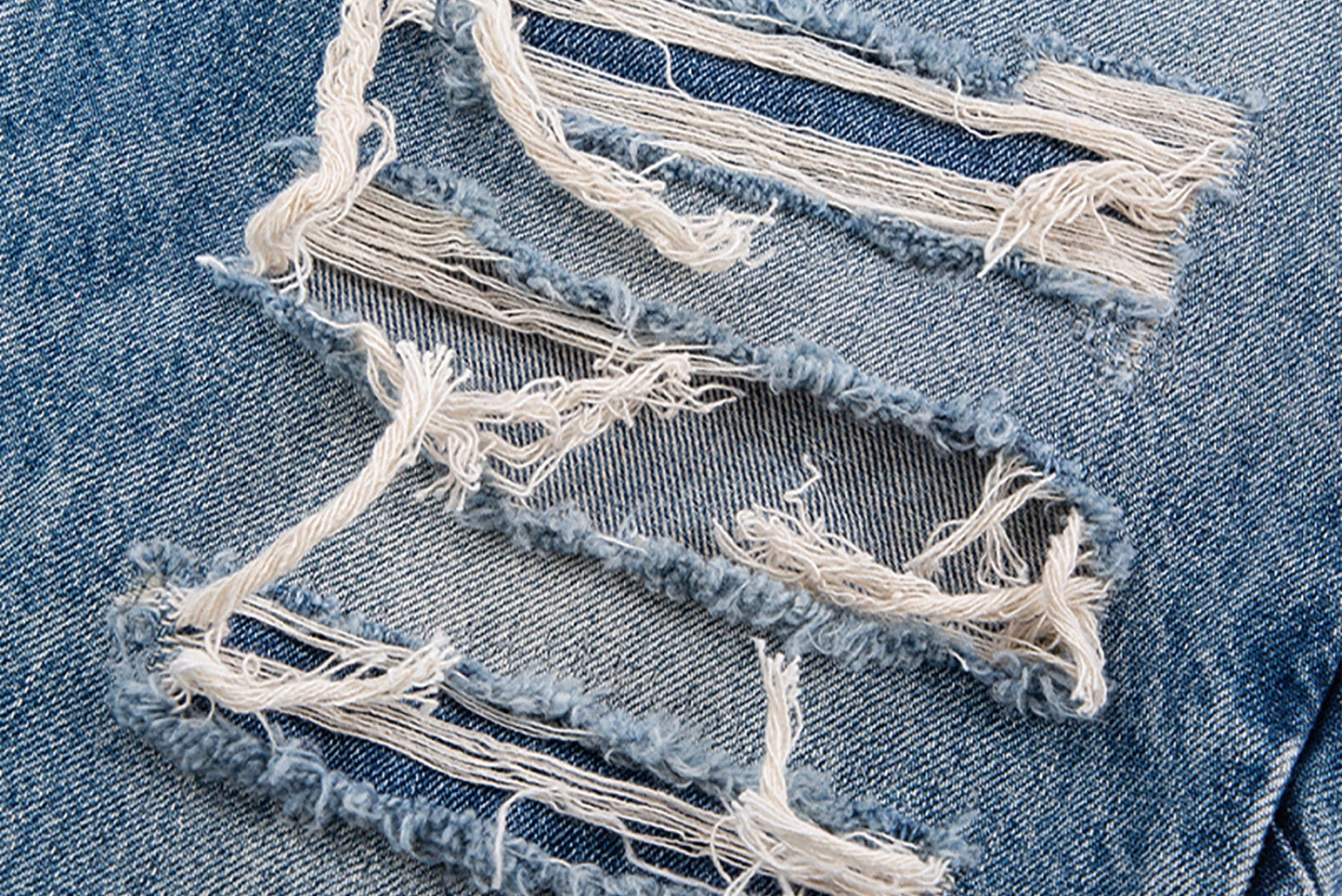 Ripped Curved Spliced Jeans