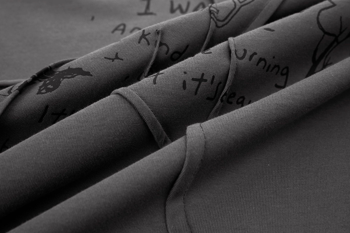 Asymmetrical Pleated Script Graphic T-Shirt