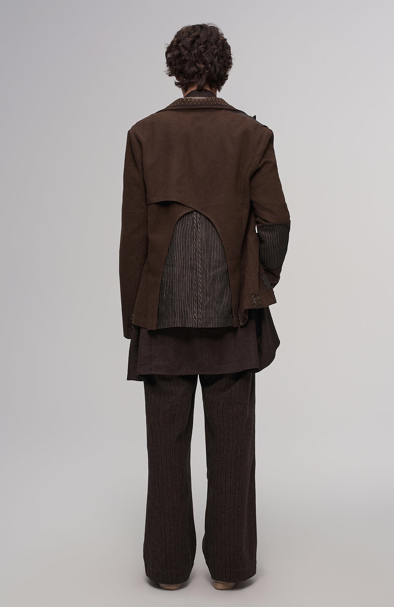Deconstructed Paneled Belted Vest