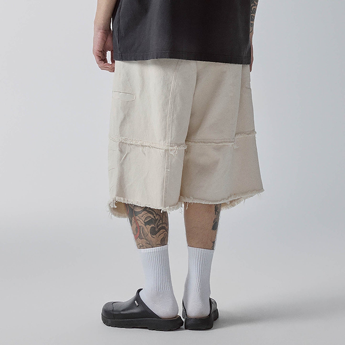 Layered Spliced Frayed-Edge Shorts