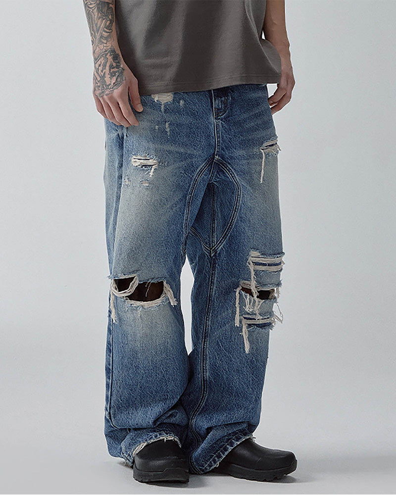 Ripped Curved Spliced Jeans