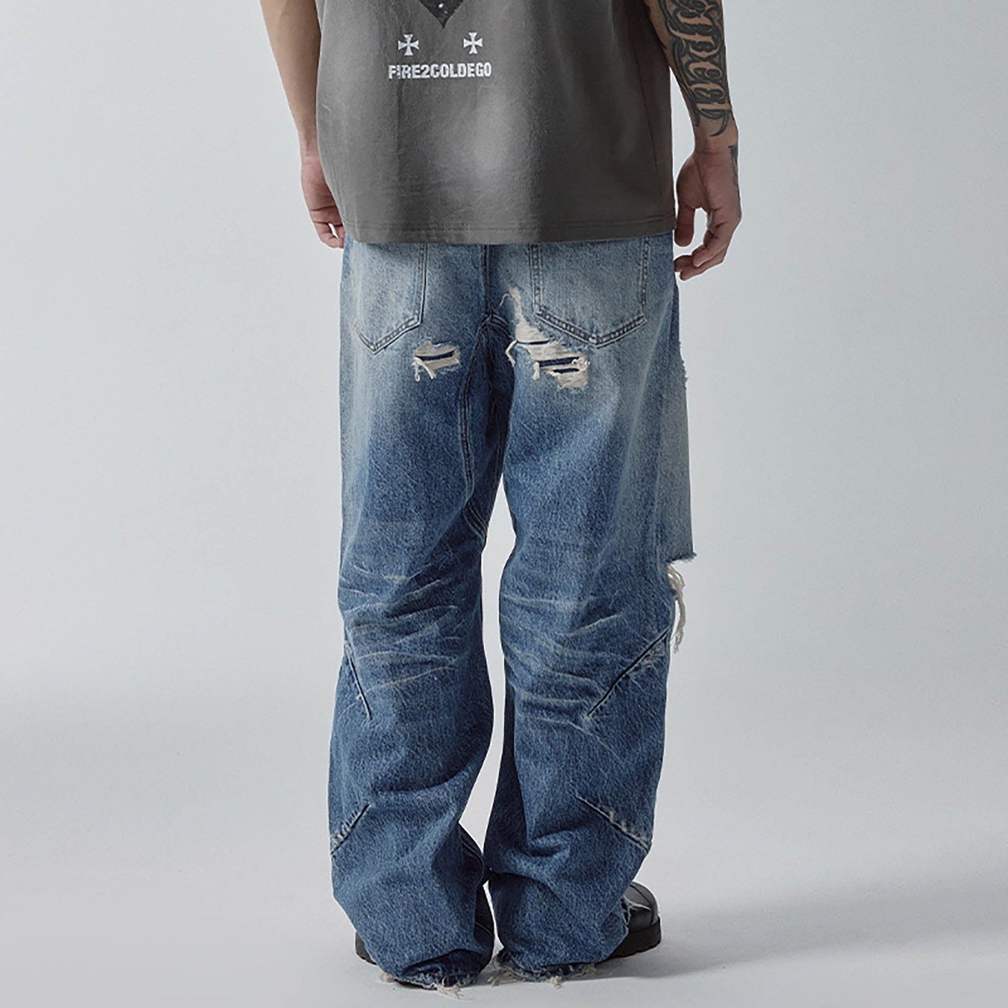 Ripped Curved Spliced Jeans