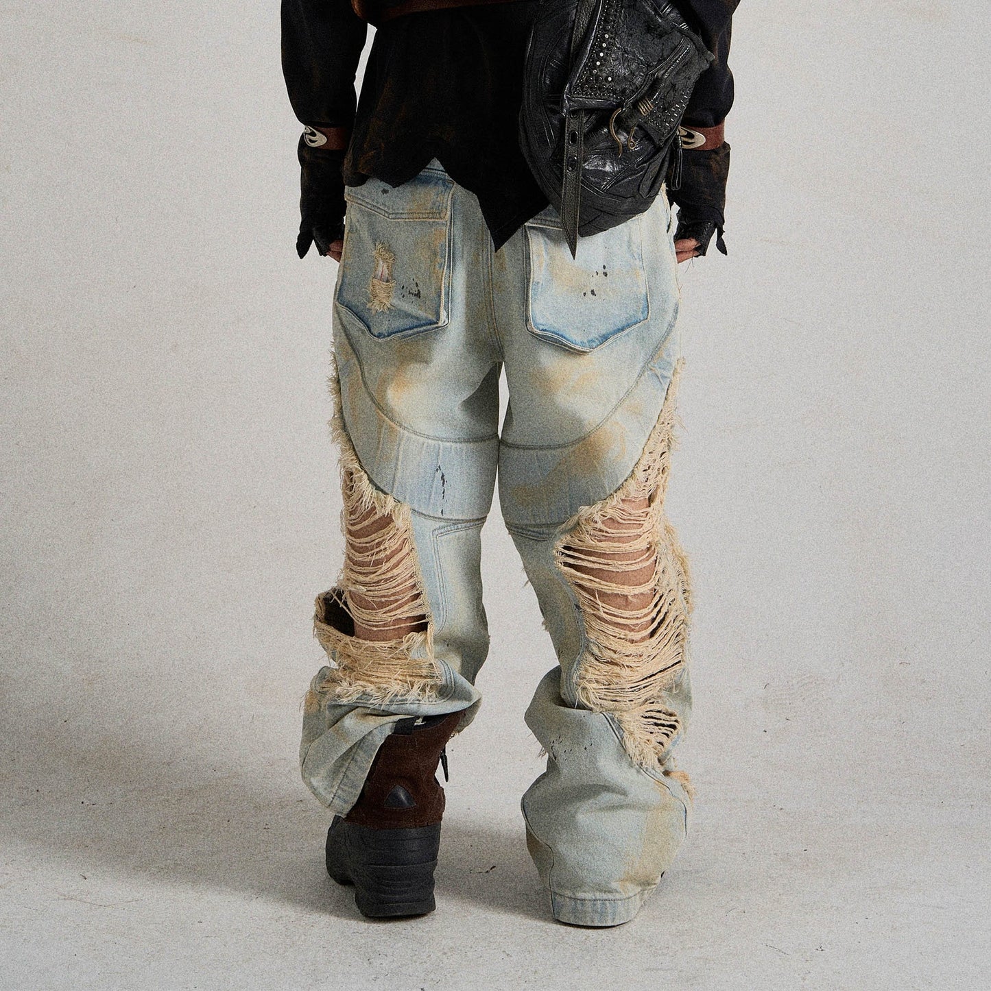Paneled Heavily Ripped Fringe Jeans