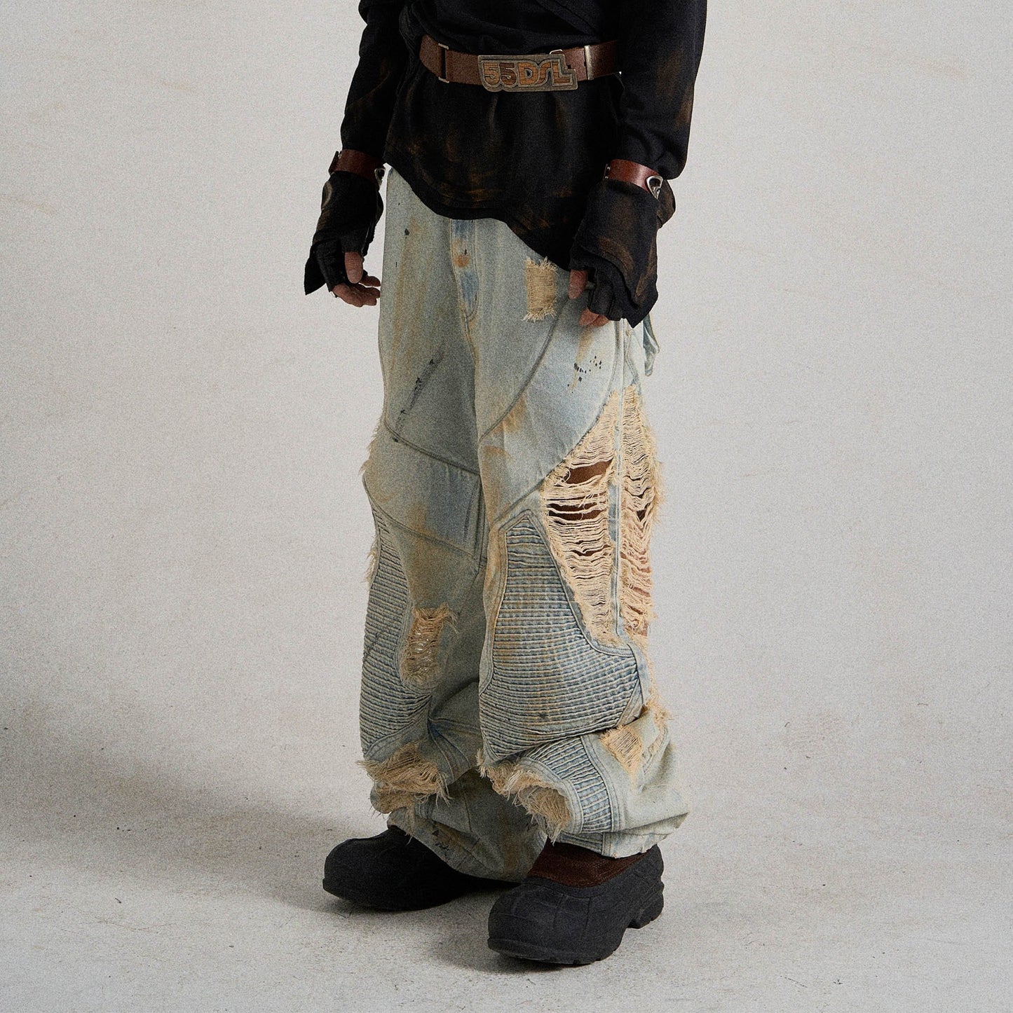 Paneled Heavily Ripped Fringe Jeans