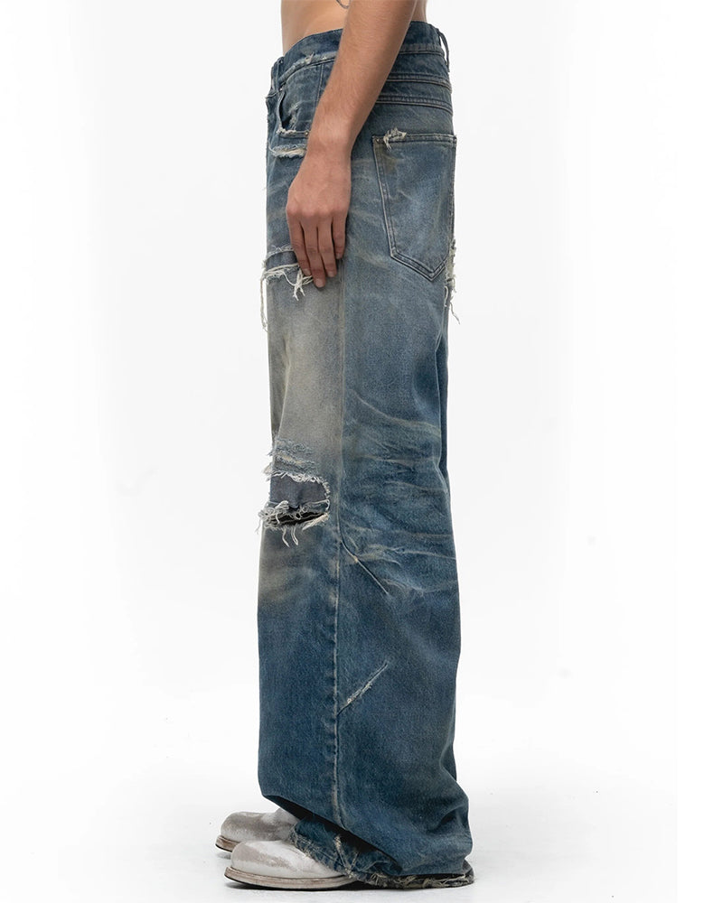Ripped Curved Spliced Jeans
