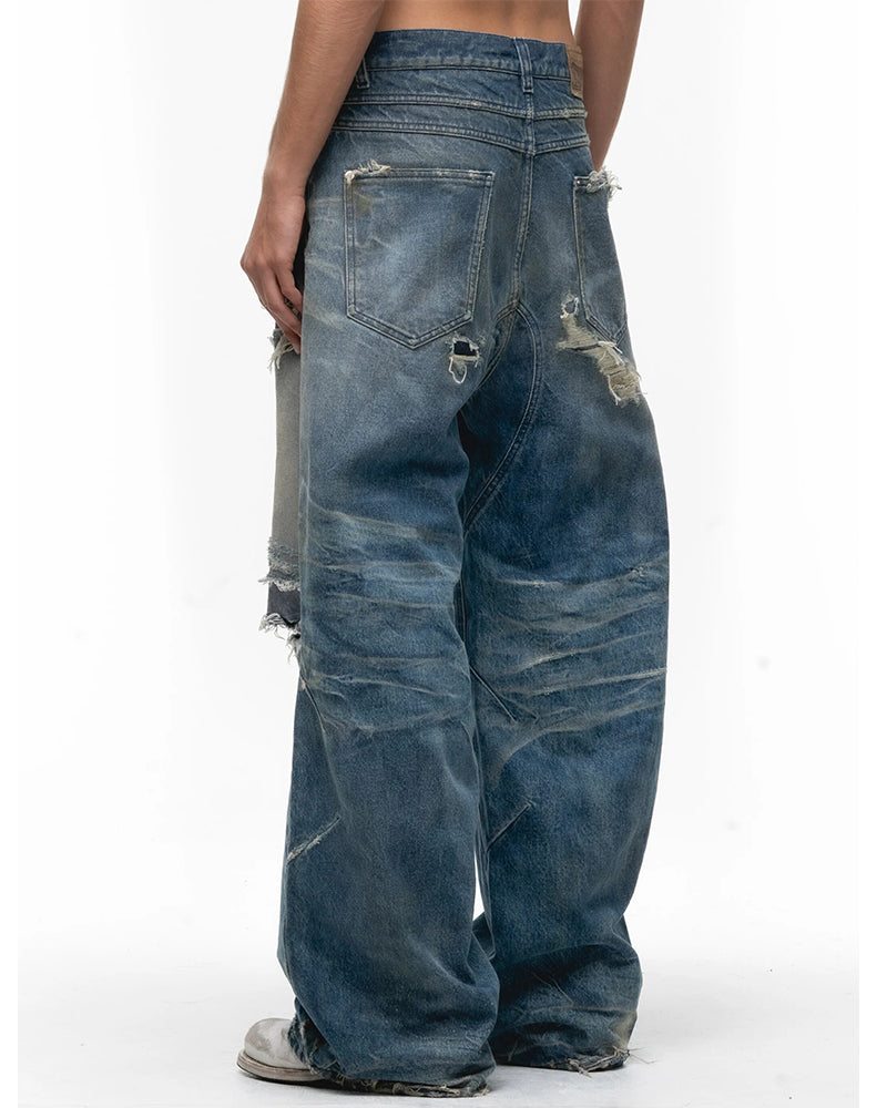 Ripped Curved Spliced Jeans
