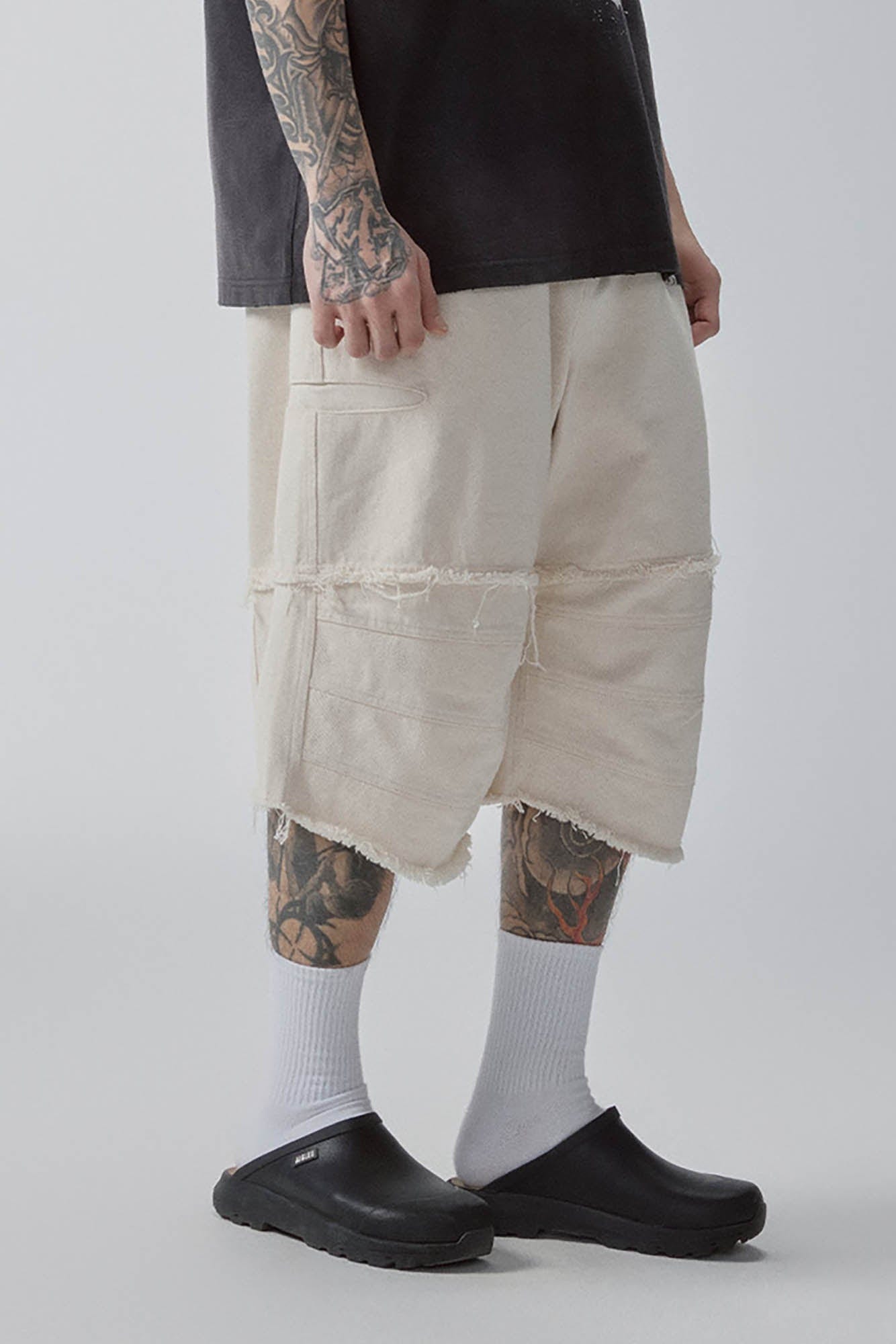 Layered Spliced Frayed-Edge Shorts