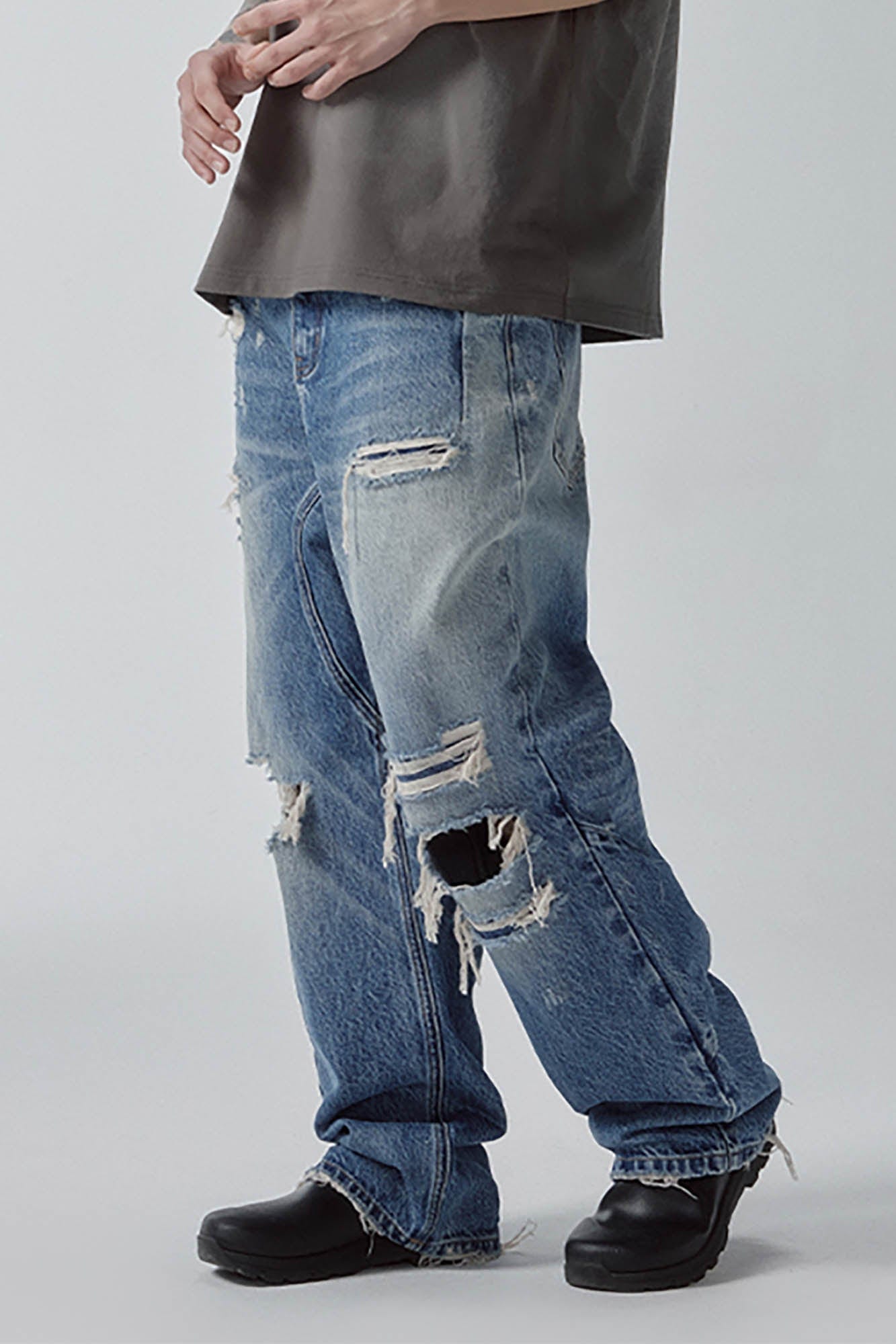 Ripped Curved Spliced Jeans