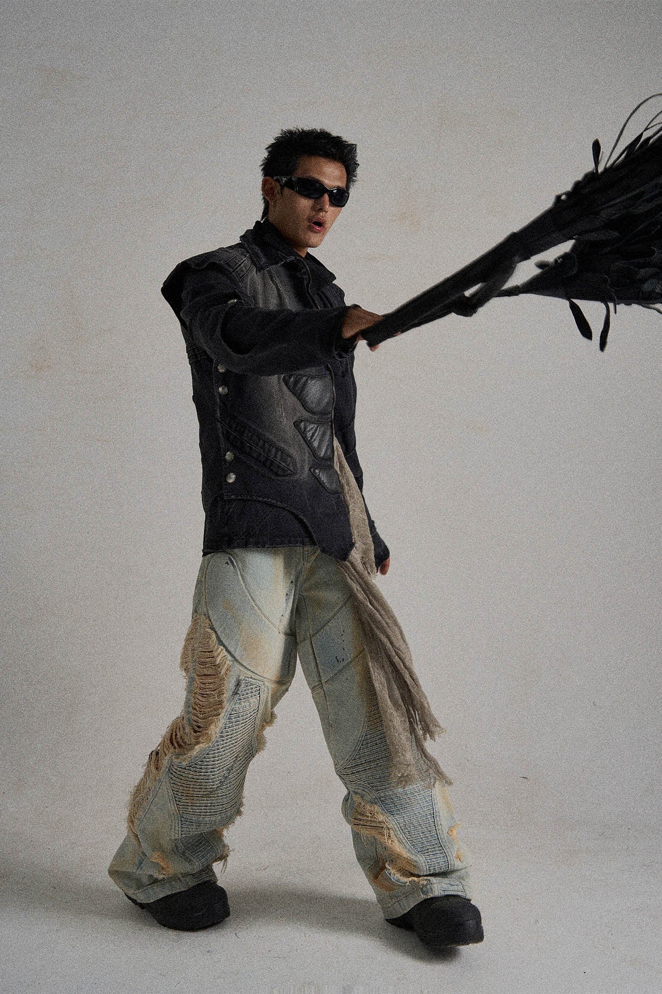 Paneled Heavily Ripped Fringe Jeans