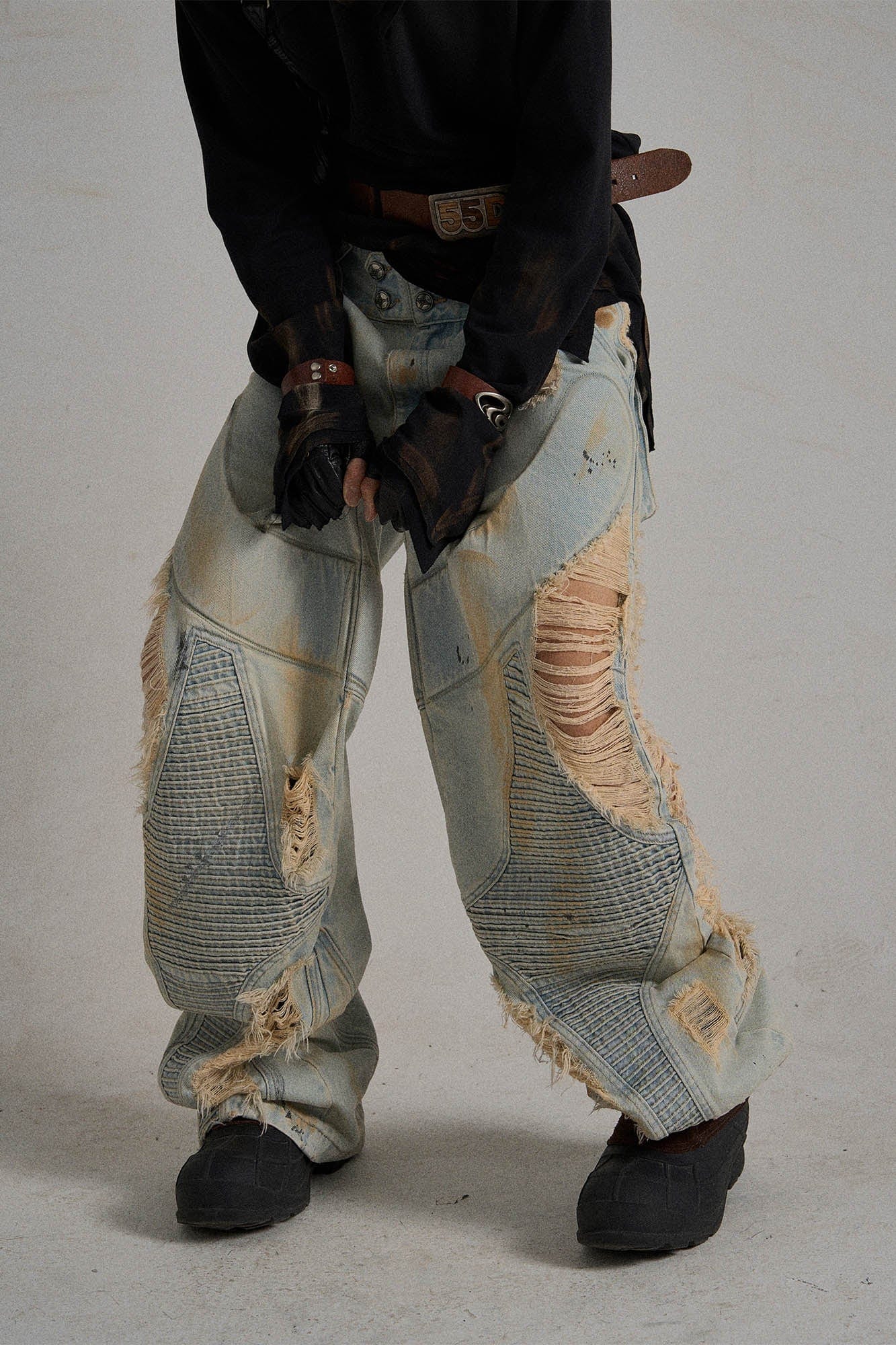 Paneled Heavily Ripped Fringe Jeans