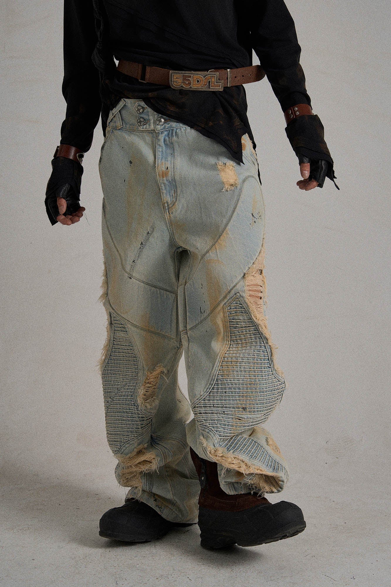 Paneled Heavily Ripped Fringe Jeans