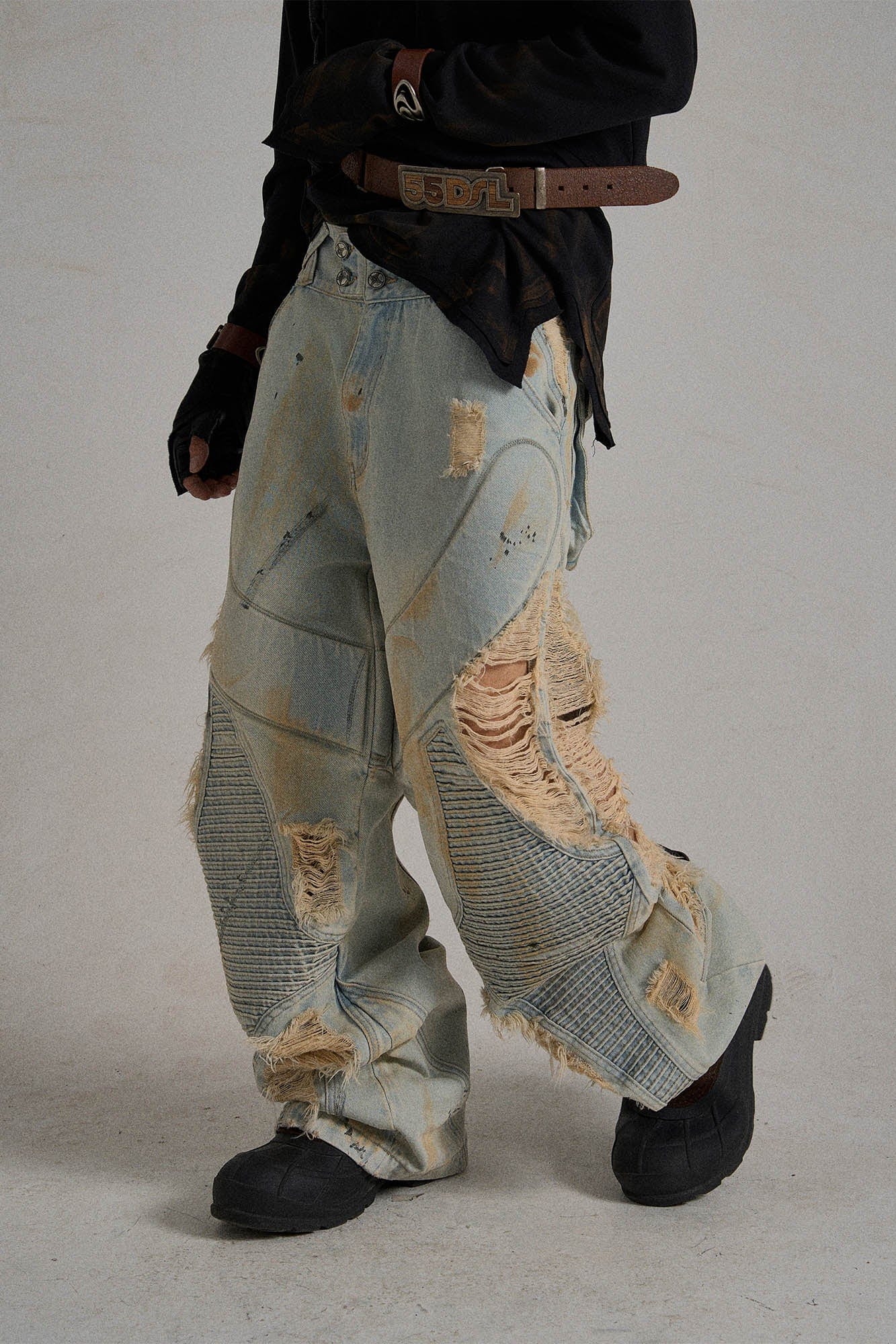 Paneled Heavily Ripped Fringe Jeans